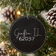 Black leatherette Christmas ornament laser engraved with the Script City zip code design