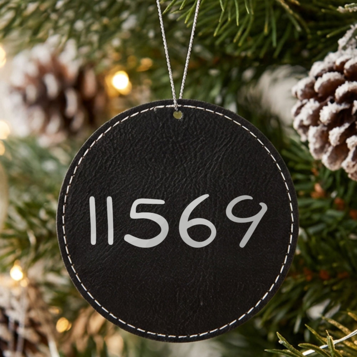 Black leatherette Christmas ornament laser engraved with the Zip Code Only zip code design