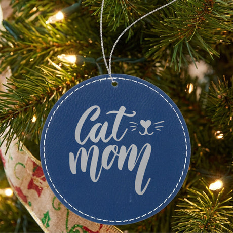 Blue leatherette Christmas ornament engraved with Cat Mom, Whiskers design