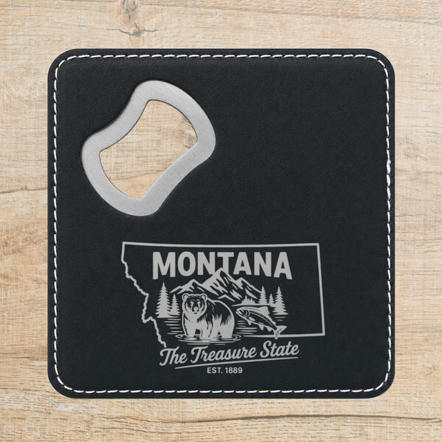 Black leatherette bottle opener coaster laser engraved with a Montana design of a grizzly bear, a trout and mountain peaks