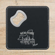 Black leatherette bottle opener coaster laser engraved with a New York design of the Statue of Liberty and the Manhattan skyline