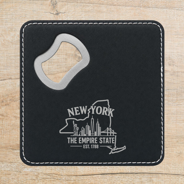 Black leatherette bottle opener coaster laser engraved with a New York design of the Statue of Liberty and the Manhattan skyline