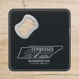 Black leatherette bottle opener coaster laser engraved with a Tennessee design of a guitar, a riverboat and the Smoky Mountains