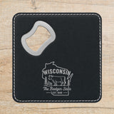 Black leatherette bottle opener coaster laser engraved with a Wisconsin design of a dairy cow and a wedge of cheese