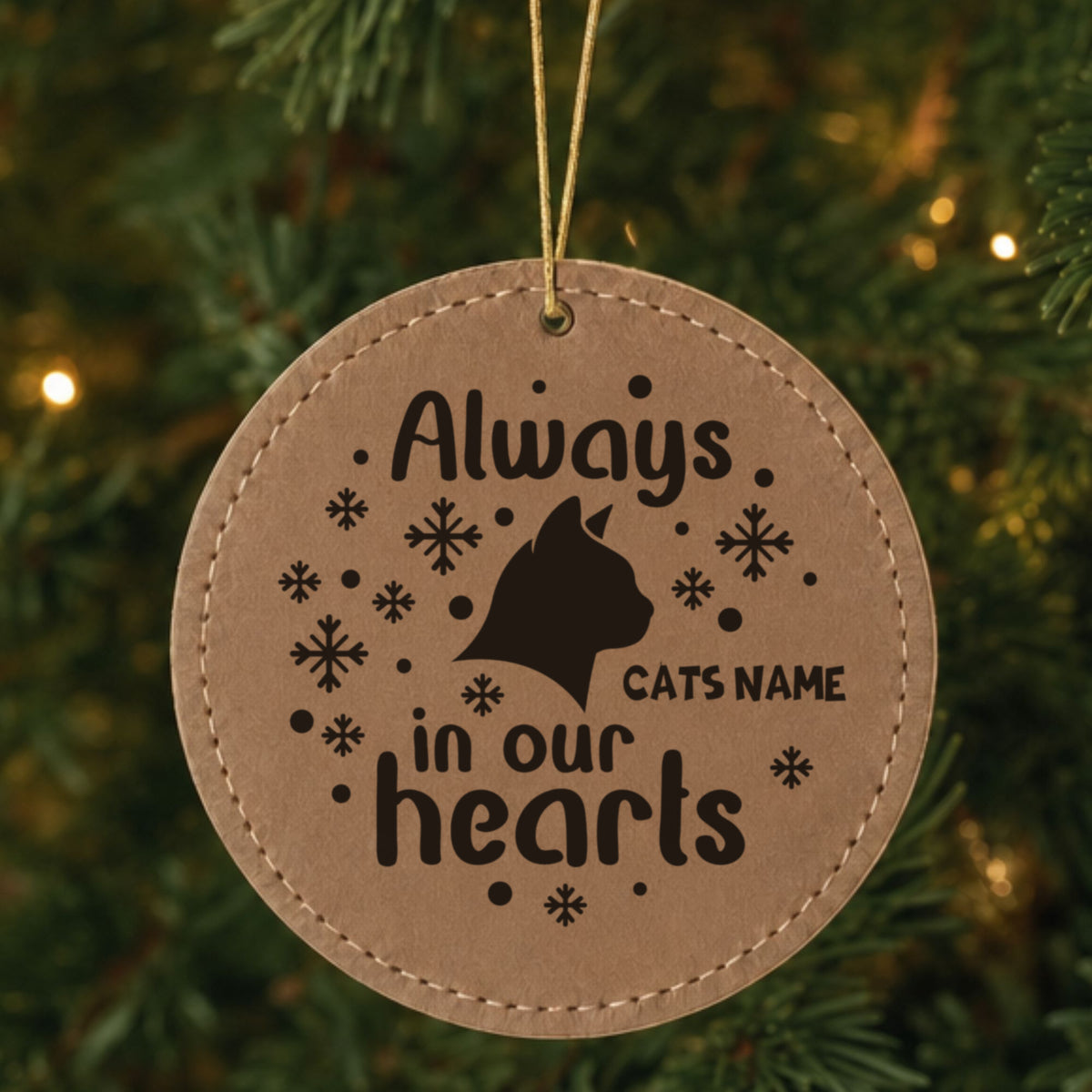 Brown leatherette Christmas ornament engraved with the Always in Our Hearts cat design