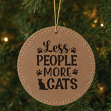 Brown leatherette Christmas ornament engraved with Less People, More Cats, Classic design
