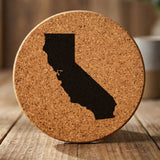 California round cork coaster with the full state shape engraved