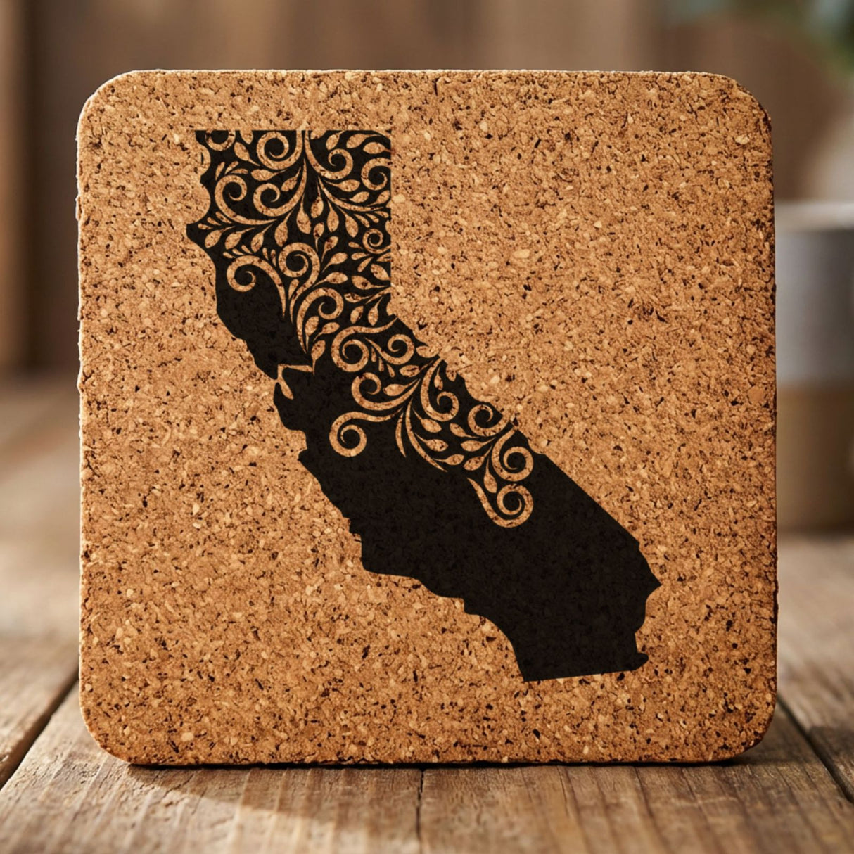 California square cork coaster engraved with the state shape in ornate floral scrollwork