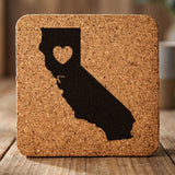 California square cork coaster engraved with the state shape and a heart