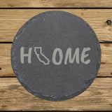 California round slate coaster engraved with HOME using the state outline as the letter O
