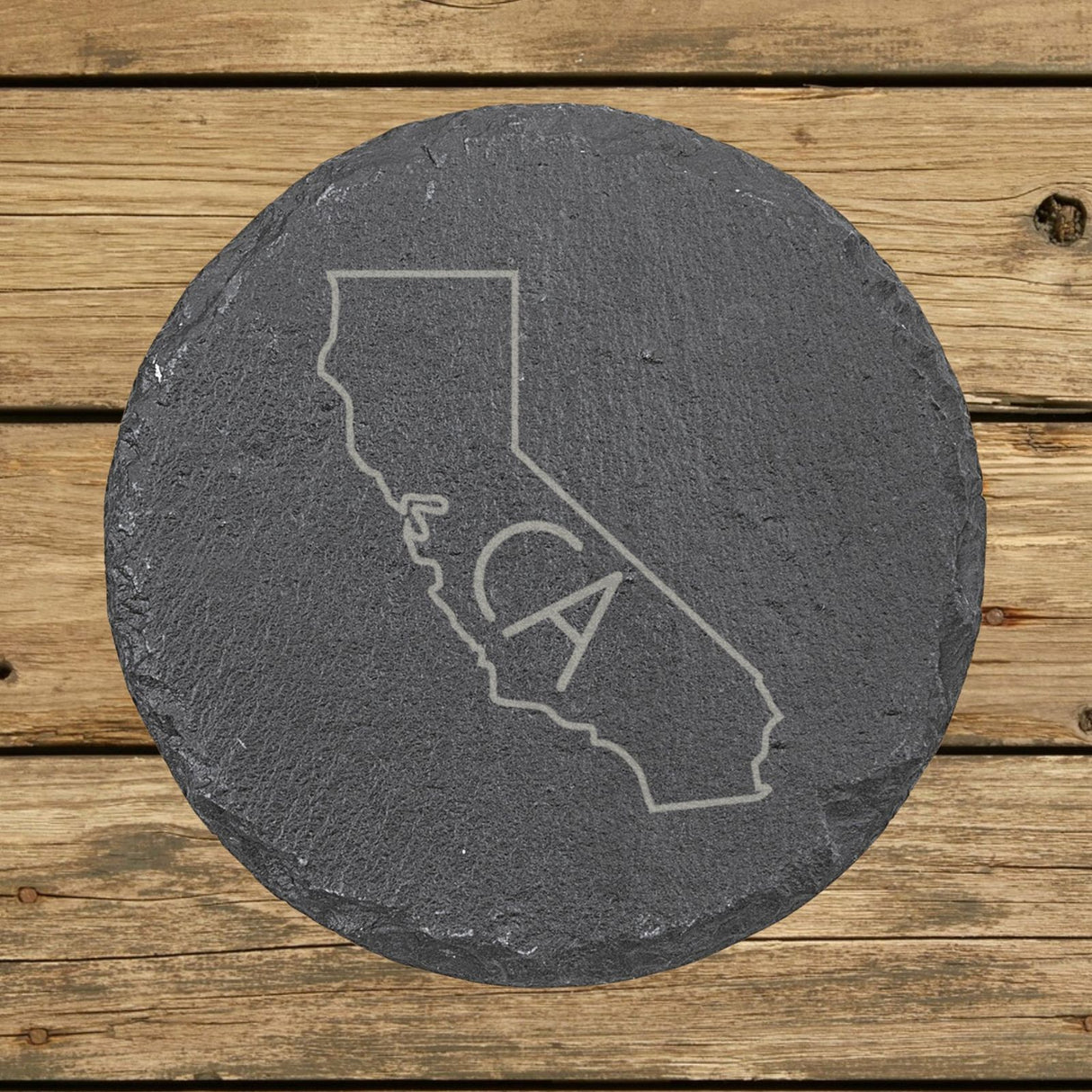 California round slate coaster engraved with the state outline and CA initials
