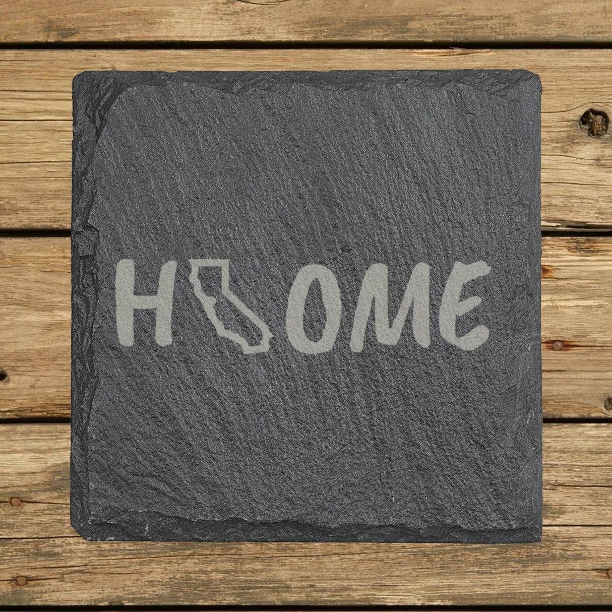California square slate coaster engraved with HOME using the state outline as the letter O