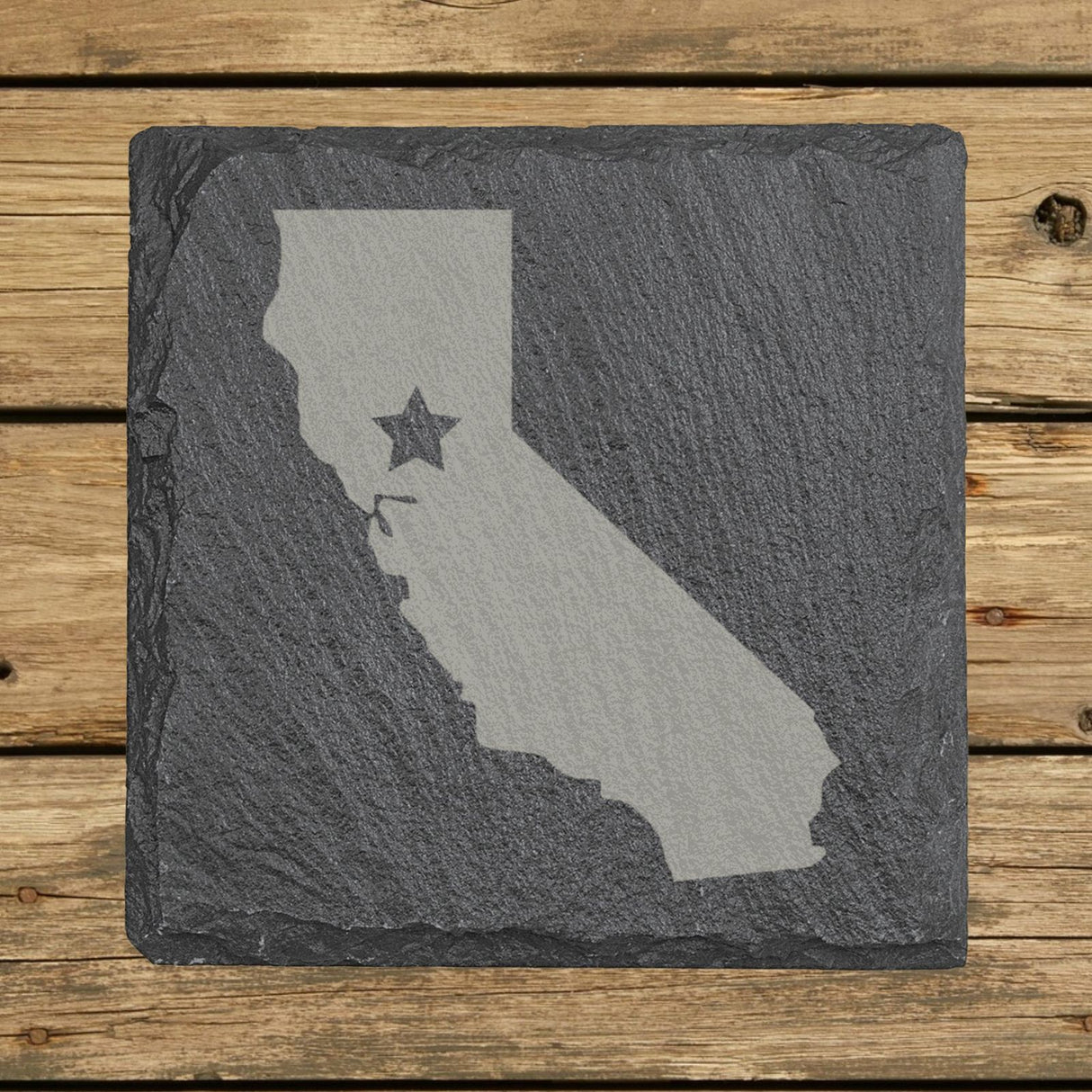 California square slate coaster engraved with the state shape and a star