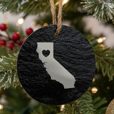 California round slate Christmas ornament engraved with the state shape and a heart