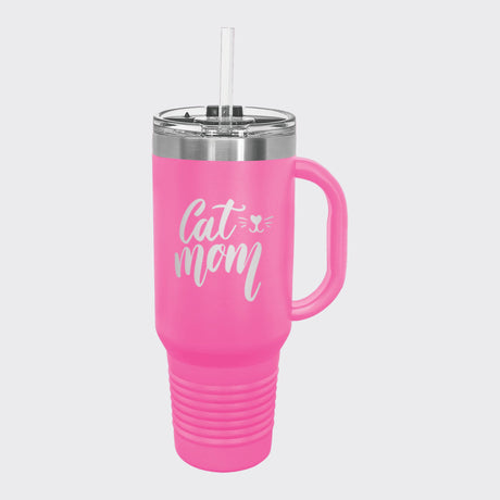 Pink 40 oz tumbler with handle and straw laser engraved with "Cat Mom"