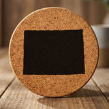 Colorado round cork coaster with the full state shape engraved