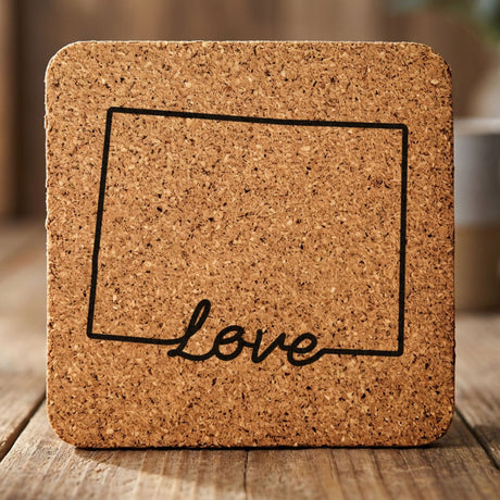 Colorado square cork coaster engraved with a hand-drawn state outline and love in cursive