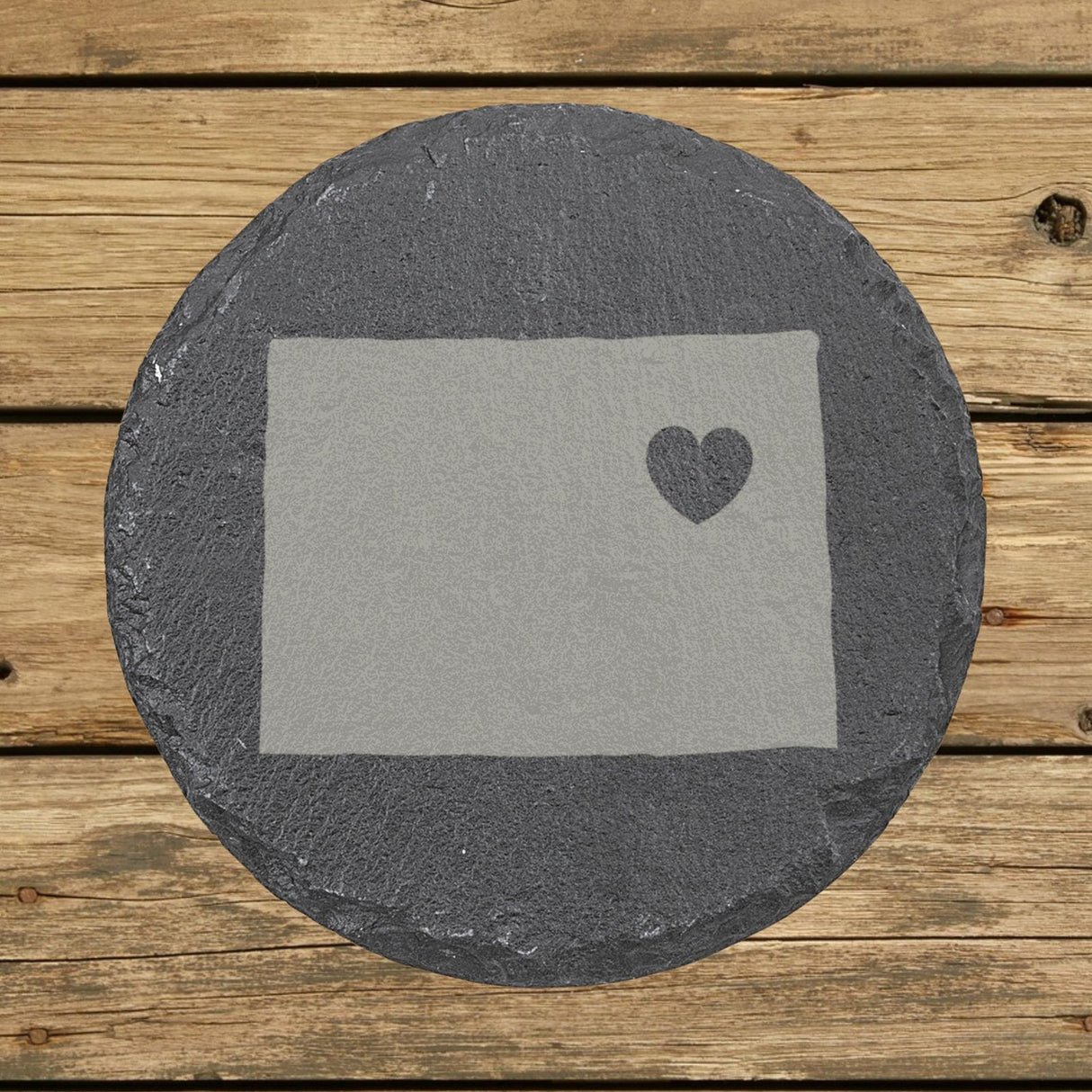 Colorado round slate coaster engraved with the state shape and a heart