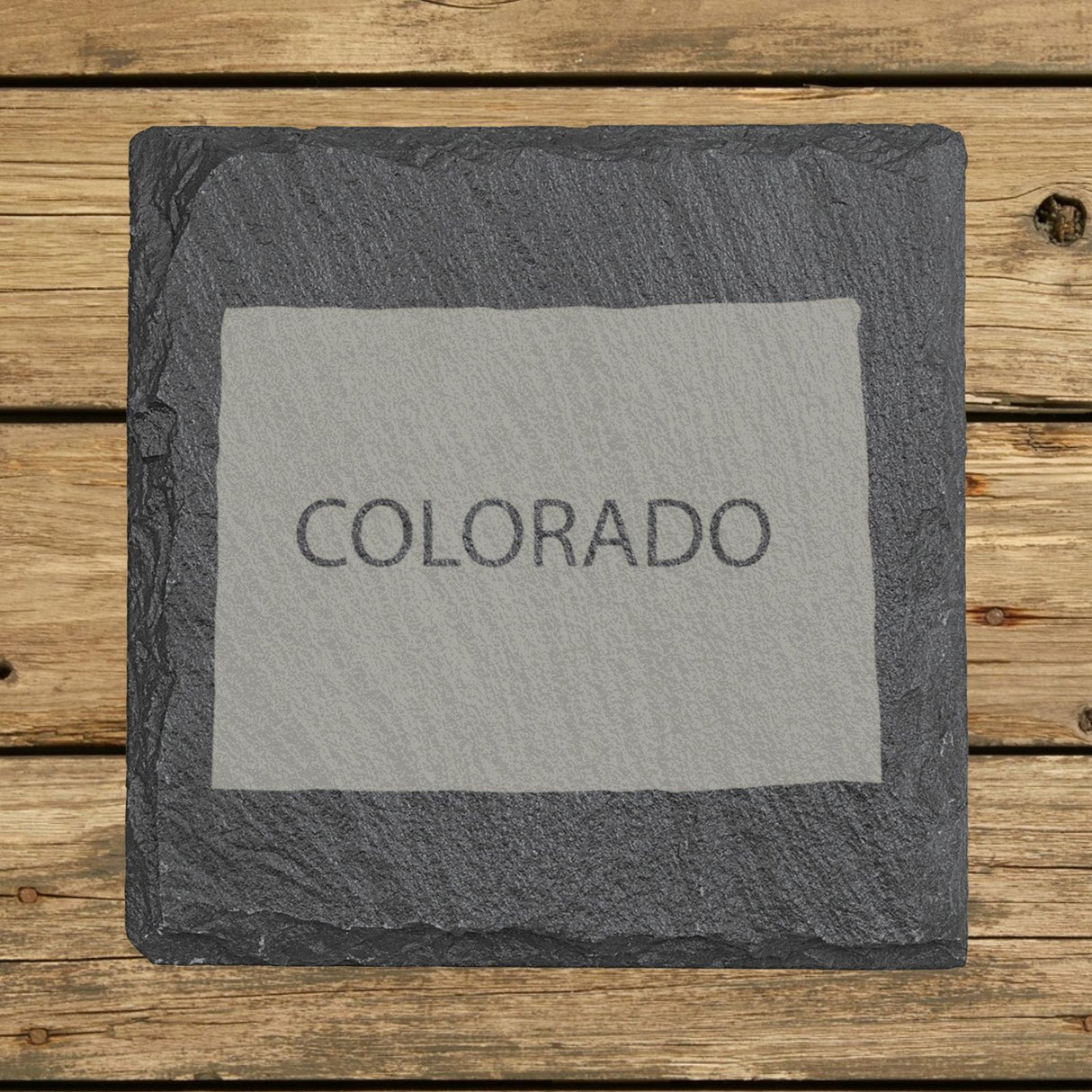 Colorado square slate coaster engraved with the state shape and COLORADO in bold lettering