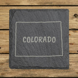 Colorado square slate coaster engraved with the state outline and COLORADO in hand-drawn brush lettering
