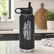 Black 32 oz insulated water bottle laser engraved with the Colorado Springs, Colorado skyline running up the side, standing on a kitchen counter