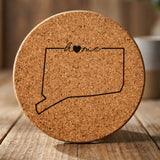 Connecticut round cork coaster engraved with the state outline and home in script with a heart