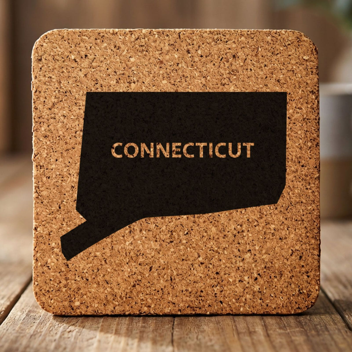 Connecticut square cork coaster engraved with the state shape and CONNECTICUT in bold lettering