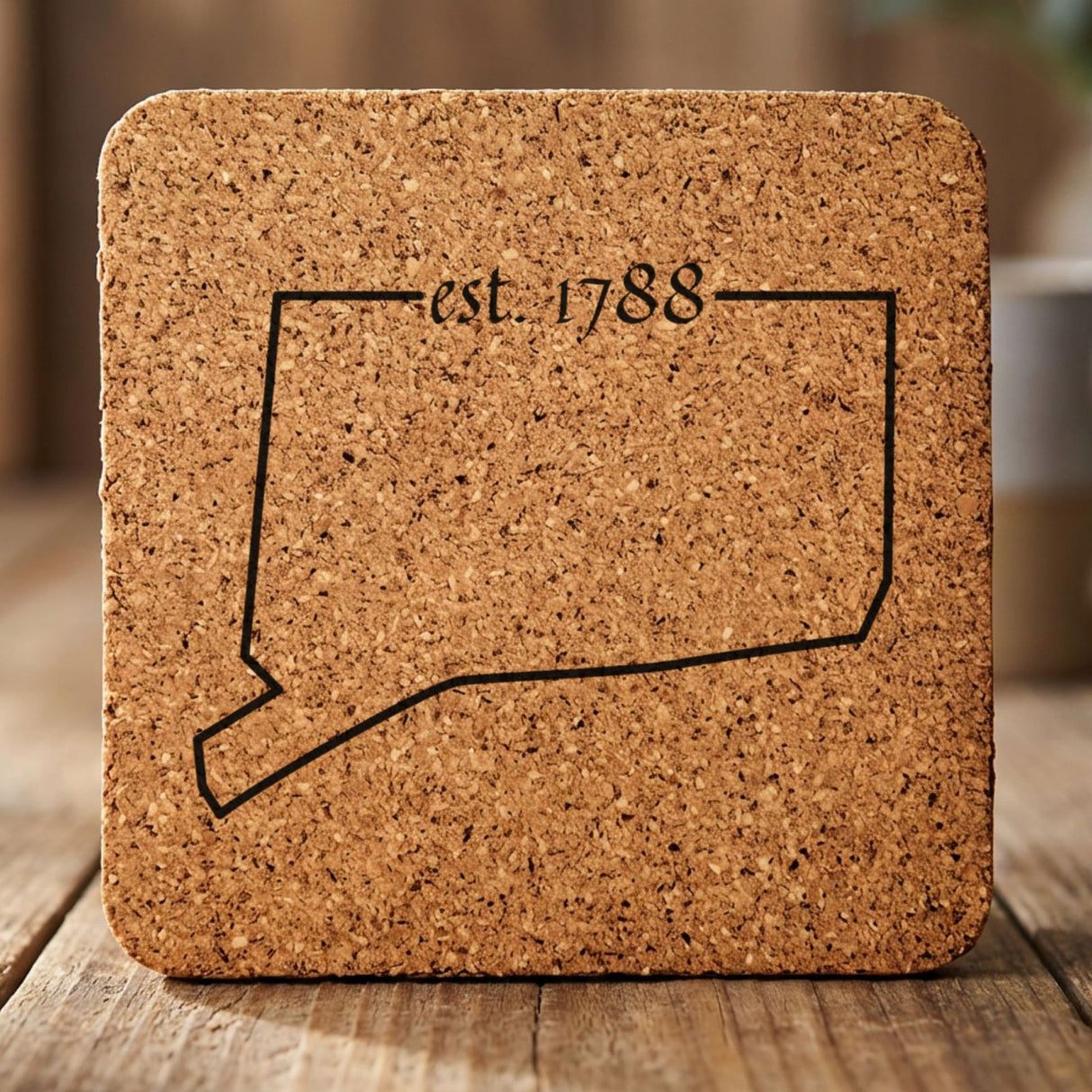 Connecticut square cork coaster engraved with the state outline and est. 1788