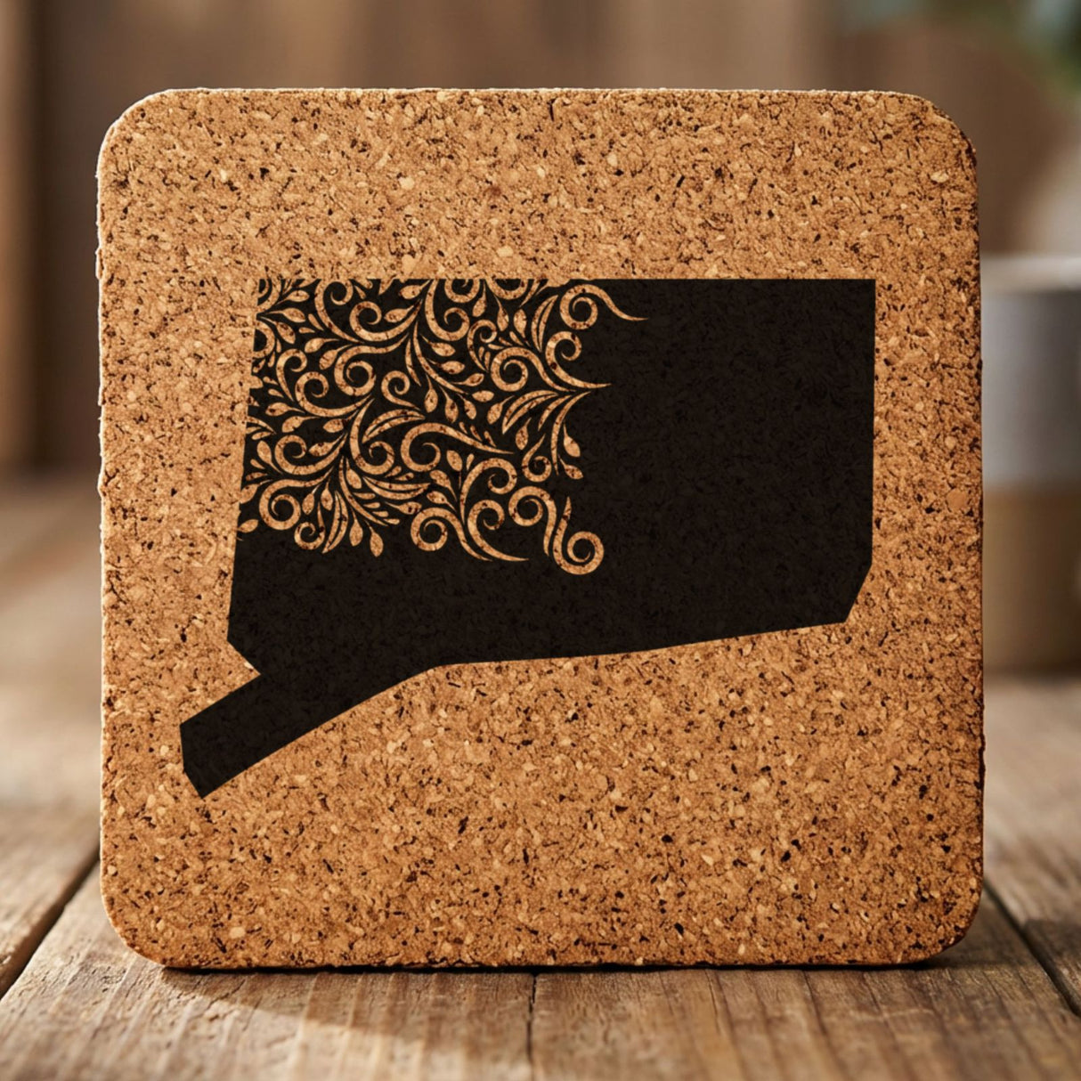 Connecticut square cork coaster engraved with the state shape in ornate floral scrollwork