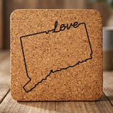 Connecticut square cork coaster engraved with a hand-drawn state outline and love in cursive
