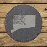 Connecticut round slate coaster engraved with the state shape in ornate floral scrollwork