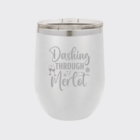 White 12 oz stemless wine tumbler laser engraved with "Dashing Through Merlot"