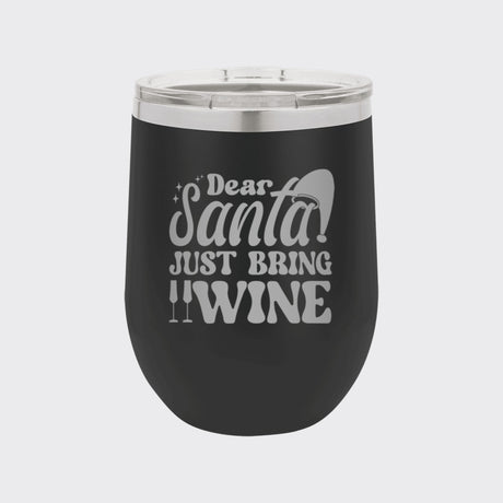 Black 12 oz stemless wine tumbler laser engraved with "Dear Santa, Just Bring Wine"