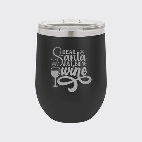 Black 12 oz stemless wine tumbler laser engraved with "Dear Santa, Just Bring Wine"