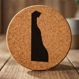 Delaware round cork coaster with the full state shape engraved