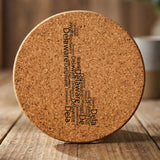 Delaware round cork coaster engraved with a word cloud of repeating Delaware text