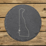 Delaware round slate coaster engraved with the state outline and home in script with a heart