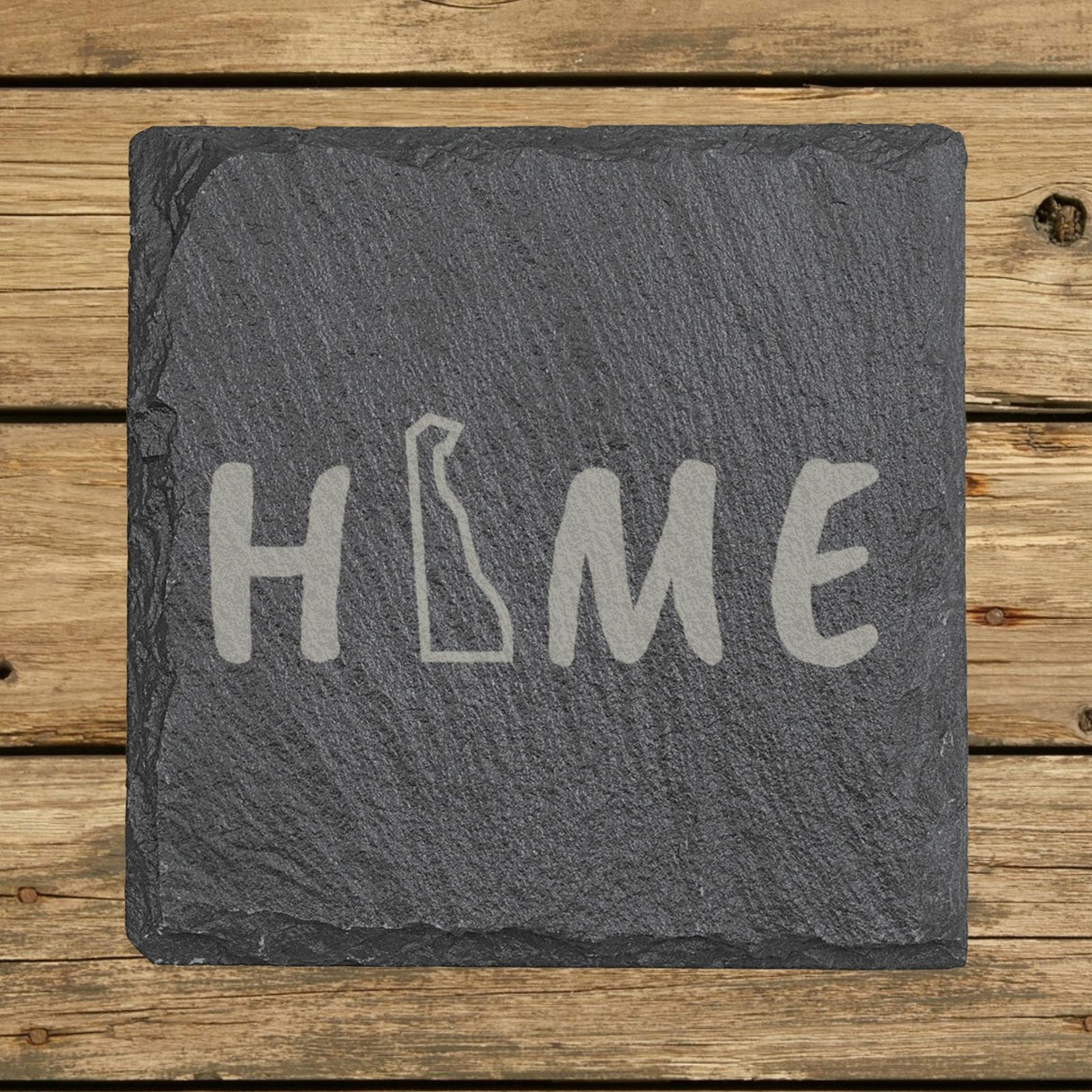 Delaware square slate coaster engraved with HOME using the state outline as the letter O