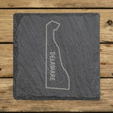 Delaware square slate coaster engraved with the state outline and DELAWARE running vertically