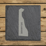 Delaware square slate coaster with the engraved state shape and DELAWARE running vertically