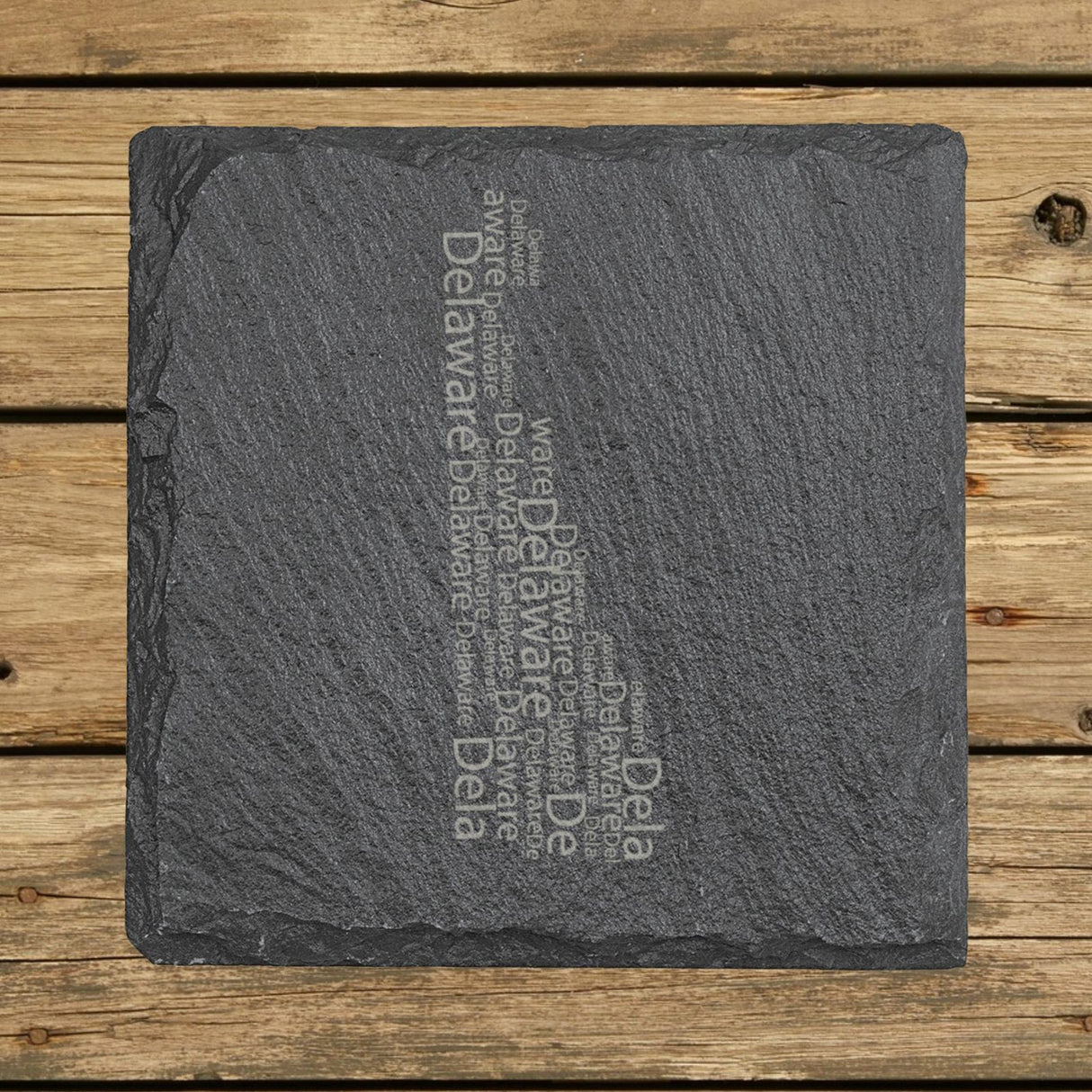 Delaware square slate coaster engraved with a word cloud of repeating Delaware text