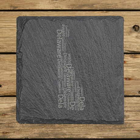 Delaware square slate coaster engraved with a word cloud of repeating Delaware text