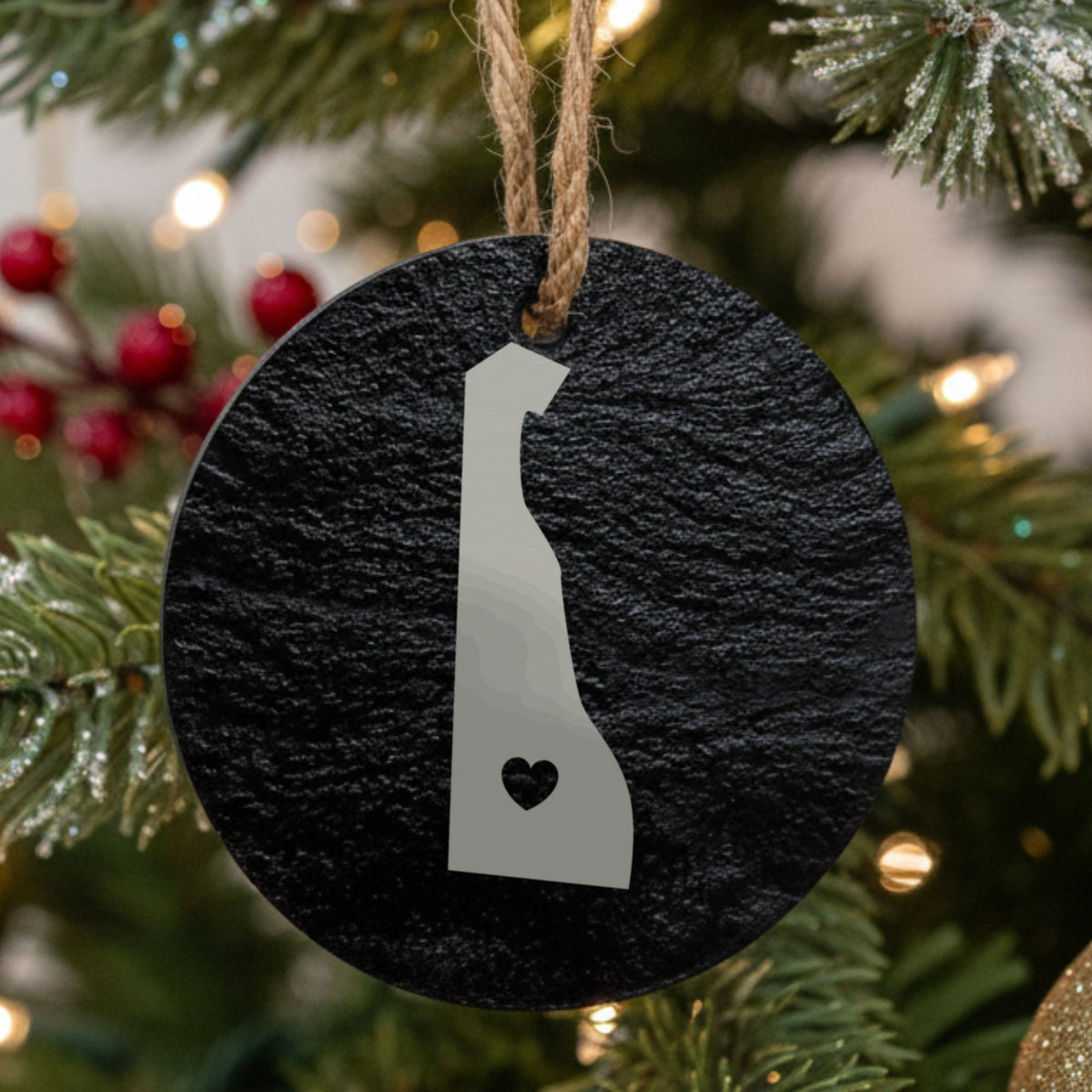 Delaware round slate Christmas ornament engraved with the state shape and a heart