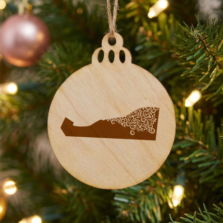 Delaware round wood Christmas ornament engraved with the state shape in ornate floral scrollwork