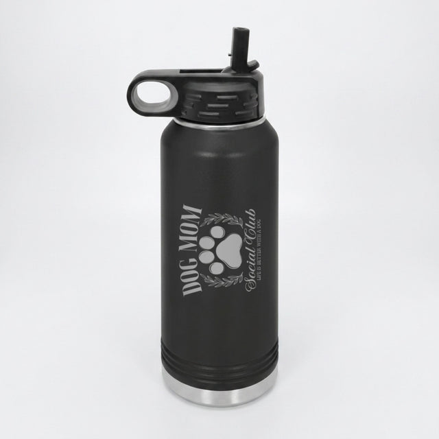 Black 32 oz insulated water bottle laser engraved with a Dog Mom Social Club crest design with a paw print and laurel wreath
