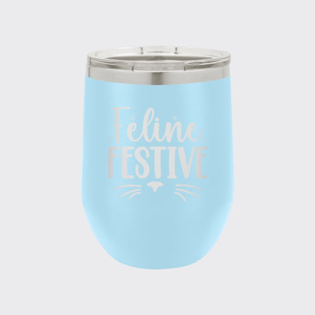 Light Blue 12 oz stemless wine tumbler laser engraved with "Feline Festive"