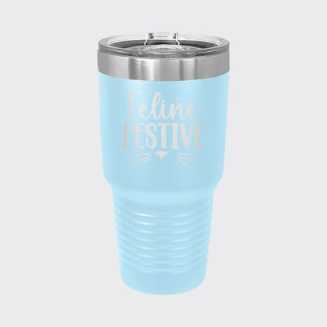 Light Blue 30 oz tumbler laser engraved with "Feline Festive"