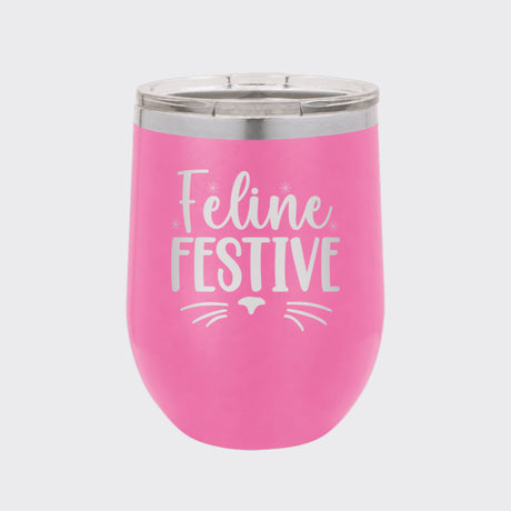 Pink 12 oz stemless wine tumbler laser engraved with "Feline Festive"