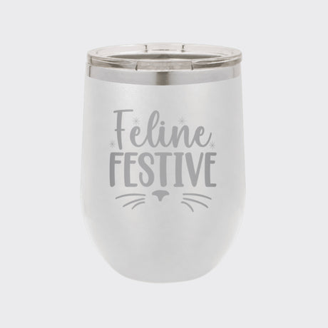 White 12 oz stemless wine tumbler laser engraved with "Feline Festive"
