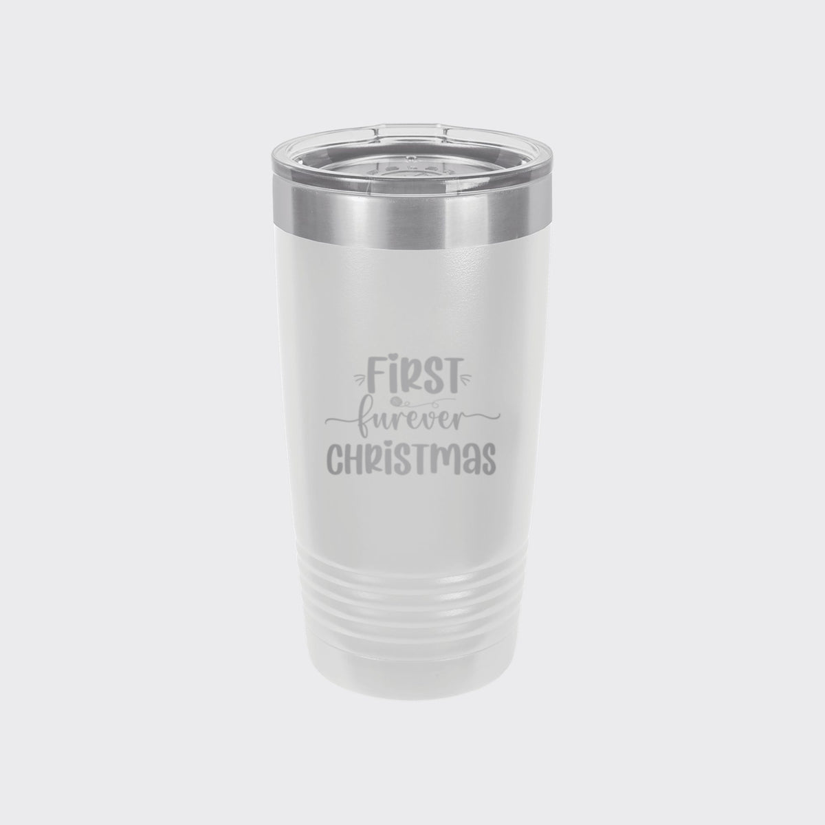 White 20 oz tumbler laser engraved with "First Furever Christmas"